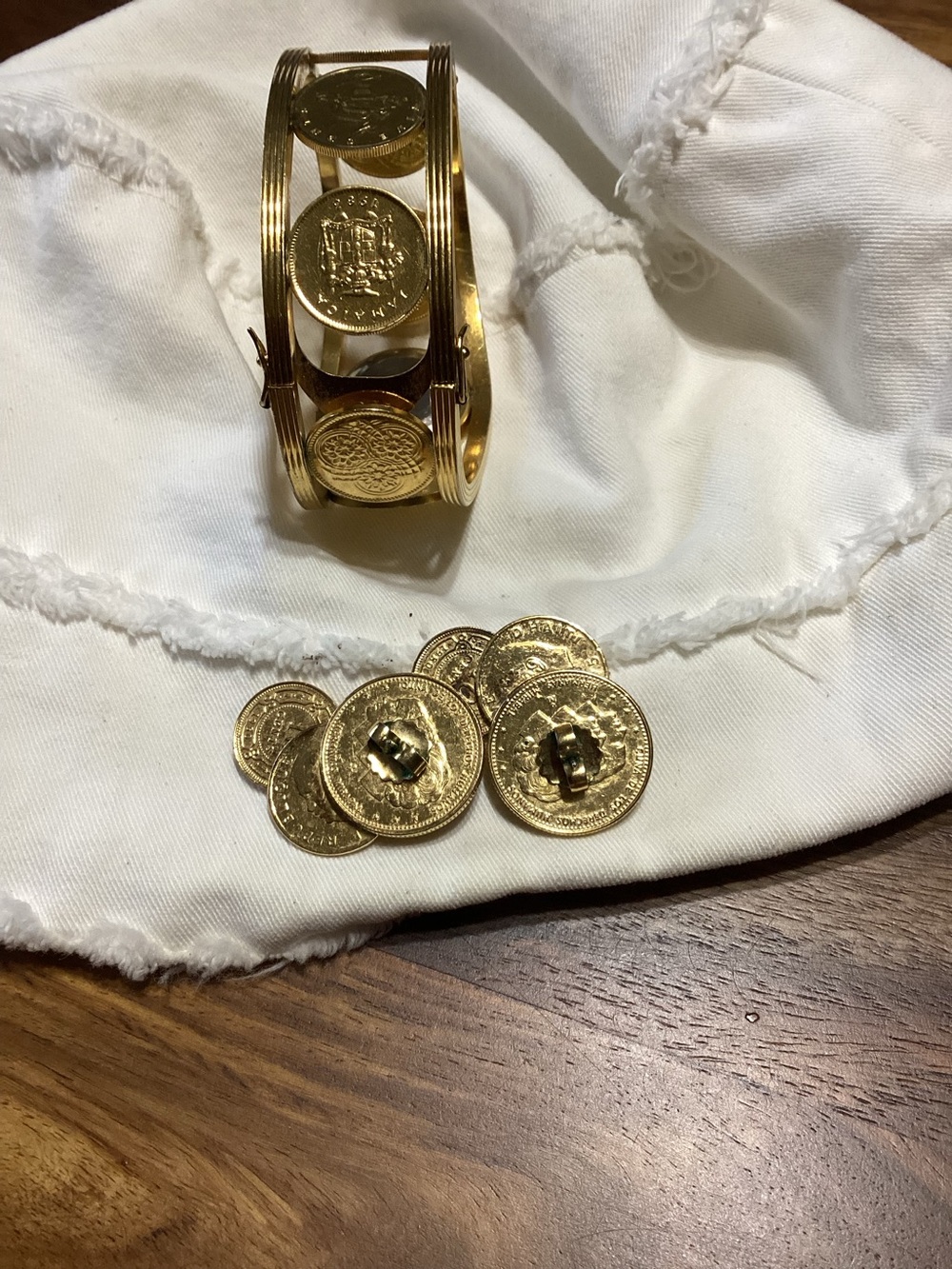 Franklin Mint, Gold Carribean Coin Watch (needs battery) and matching earrings.